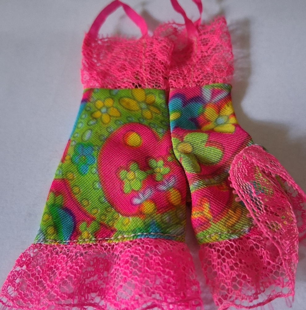 Vintage Barbie pink floral and lace slip/pedicoat.